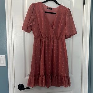 Light pink women’s dress.